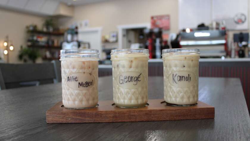 A photo Kenmore Media took for Red Otter Coffee's March Sips for a Cause marketing campaign. The photo is of a flight of coffee's named after adoptable dogs.